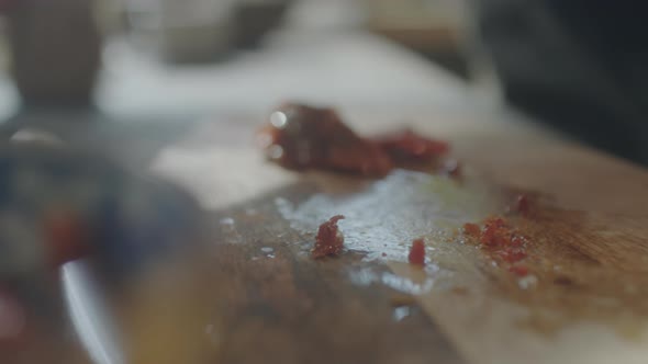 Cutting Dried Tomatoes with Knife alt