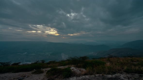 Quito, Ecuador, Timelapse - A sunrise in the mountains of Quito from the top of a hill