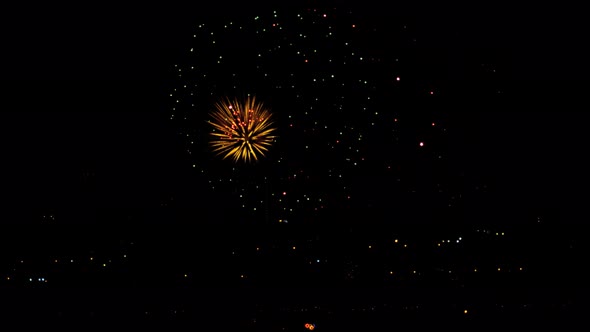 Fireworks Flashing in the Night Holiday Sky alt