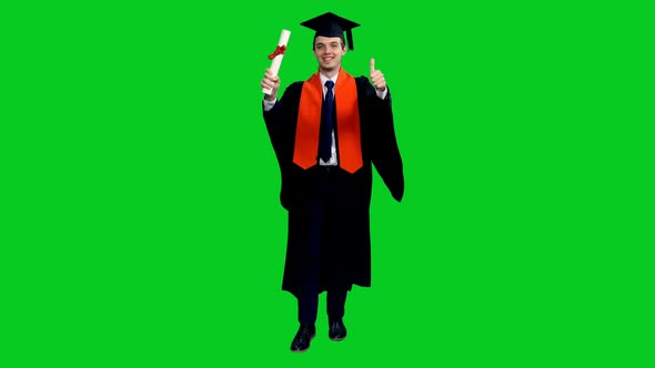 Happy Male Graduate Walking With Certificate And Showing Thumbs Up