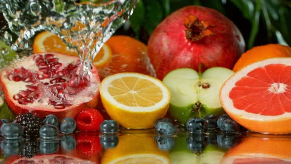 Super Slow Motion Shot of Splashing Water on Variation of Fruits at 1000Fps alt