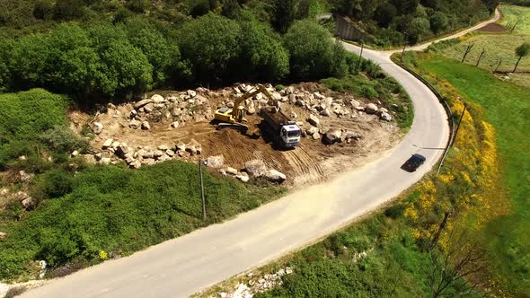 Trucks and Excavator Working alt