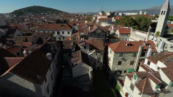 Aerial view of old stone buildings  alt
