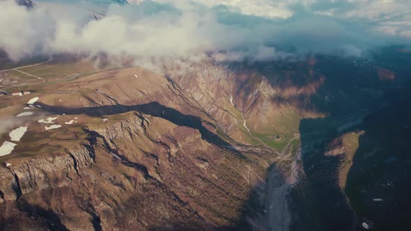 Amazing Aerial View of Mountains Covered with Clouds alt
