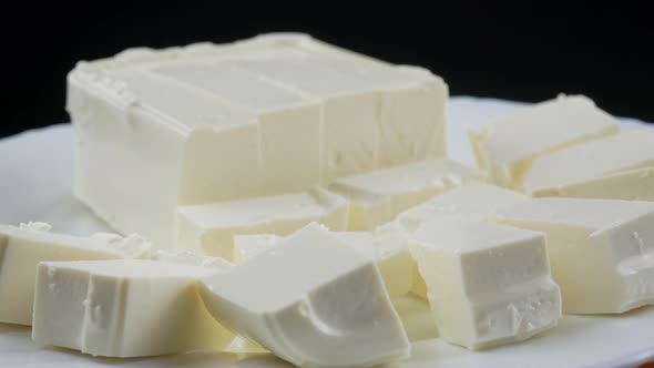 Slices feta cheese close up alt