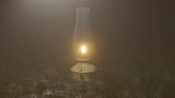 Oil lamp in the middle of the grass field late at night, Nature Landscape Forest