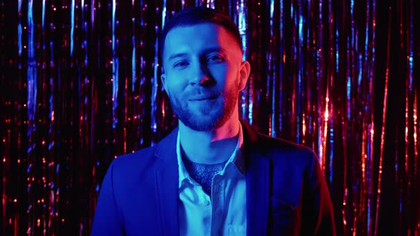 Neon Light Face Party People Smiling Man on Tinsel alt