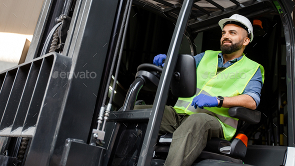 Work in warehouse, loading products for production on plant, logistics and delivery - Stock Photo - Images