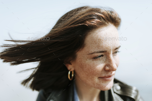 Happy woman enjoying the breeze - Stock Photo - Images