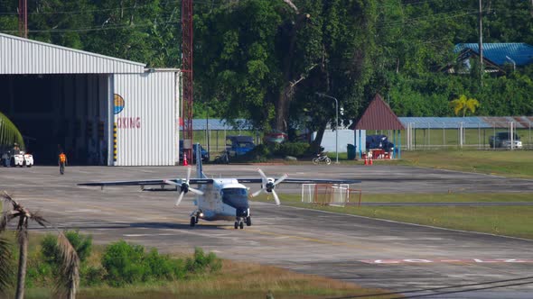 Small Transport Aircaft Taxiing From Hangar alt