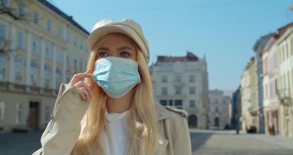 Virus Mask Woman on Street Wearing Face Protection in Prevention for Coronavirus Covid 19. Lady alt