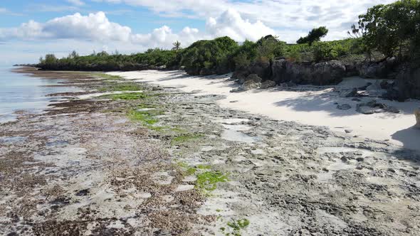 Aerial View of Low Tide in the Ocean Near the Coast of Zanzibar Tanzania Slow Motion alt