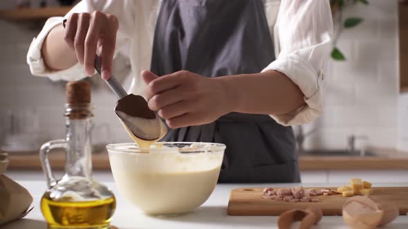 The Process Of Baking, A Woman In An Apron Prepares Breakfast In The Kitchen For A Family, A Family alt