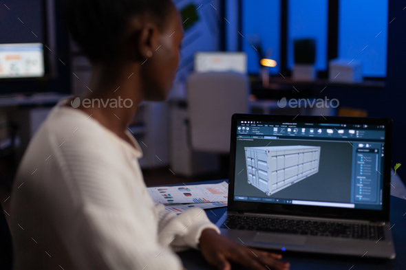 African american design arhitect working in 3D software developing prototype container idea