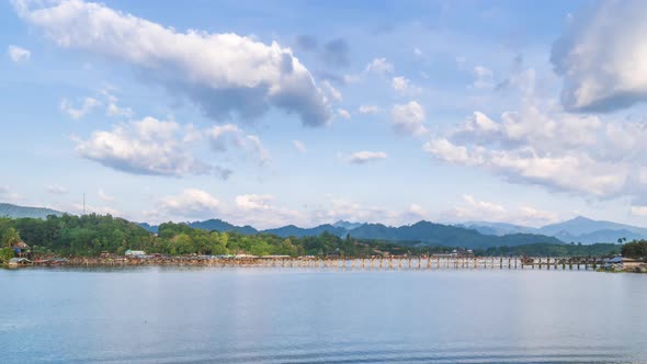 Mon Bridge, longest wooden bridge in Sangkhlaburi, Kanchanaburi, Thailand; zoom out - Time Lapse