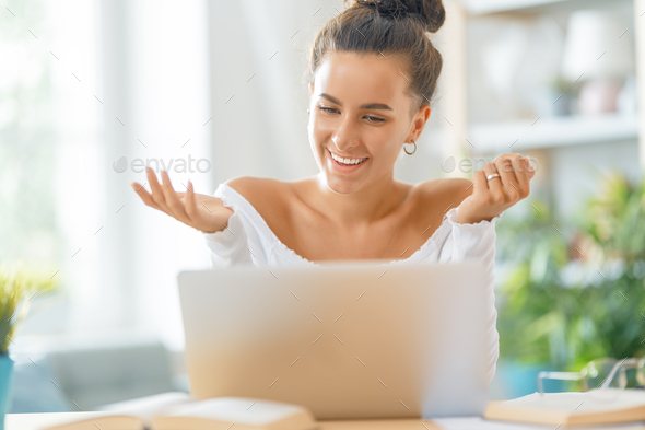 woman working on laptop at home. - Stock Photo - Images