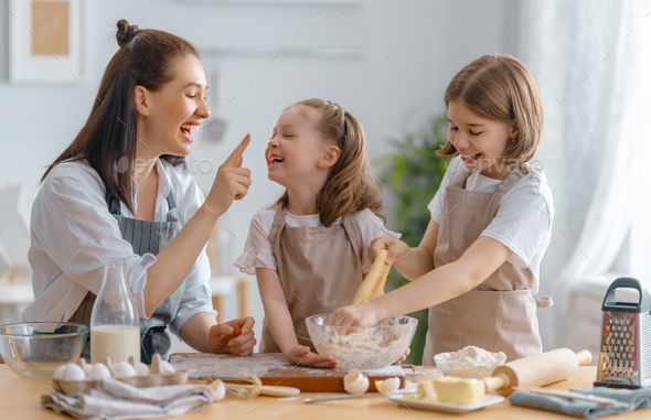 family are preparing bakery together - Stock Photo - Images