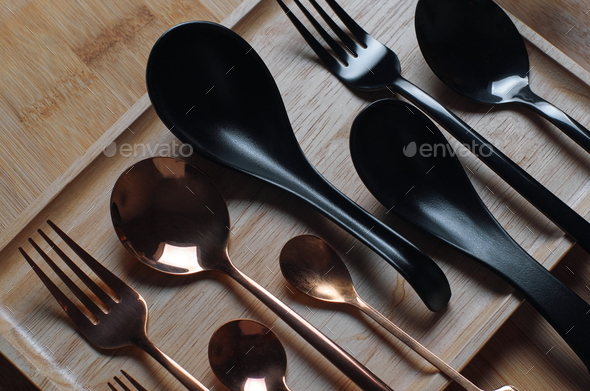 Black and copper cutlery