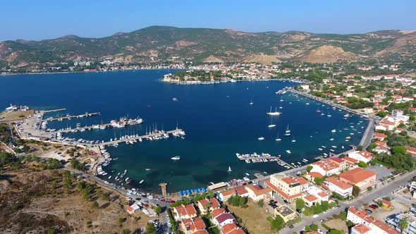 Small City Houses, Beautiful Marina and Touristic Boats in a Bay by Sea