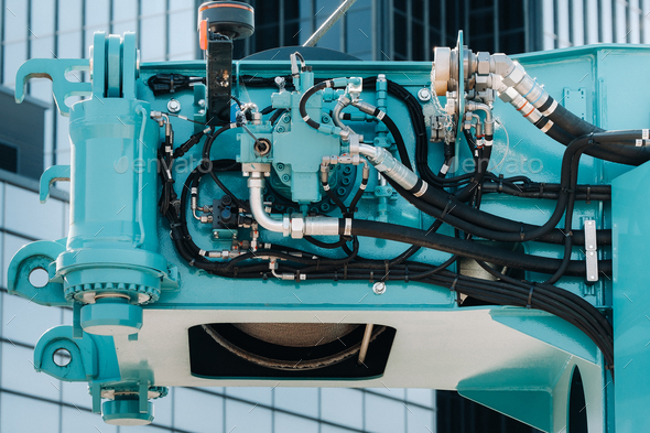Hydraulic crane engine.The control system of the crane engine.Lifting hydraulic Department on the
