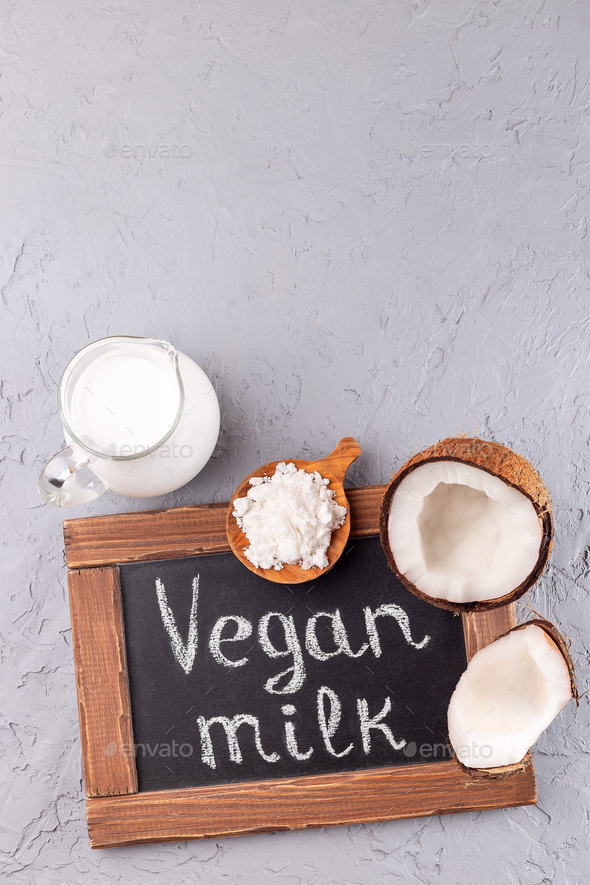 Chalk board and vegan powdered coconut milk, lactose free milk