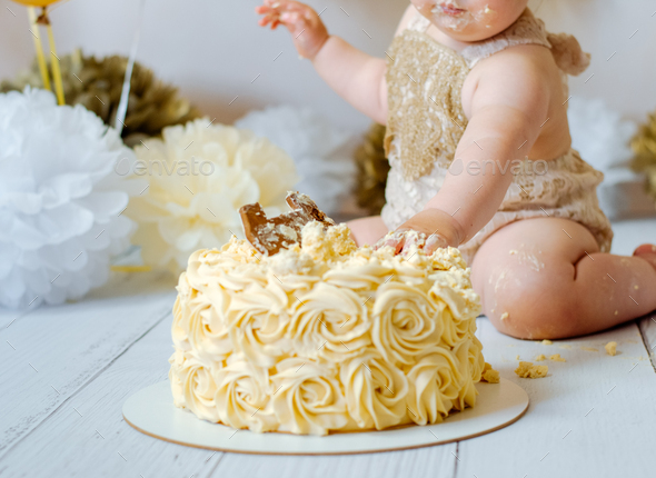 Close-up on Child\'s Hands Smashing the Cake