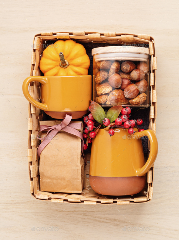Preparing care package for thanksgiving, sasonal gift box with cup, tea or coffee package and