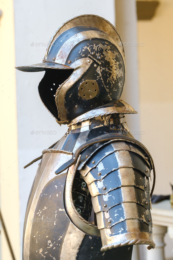 An ancient Knight's helmet with armor.A medieval concept - Stock Photo - Images