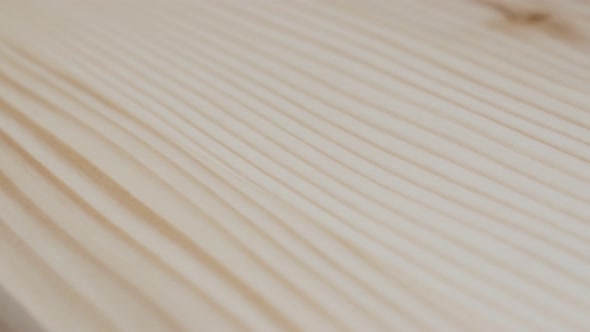 Flat sawn wood grain texture slow tilting 4K footage alt