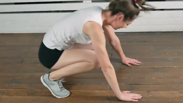 Athletic Woman Doing Fitness Indoors