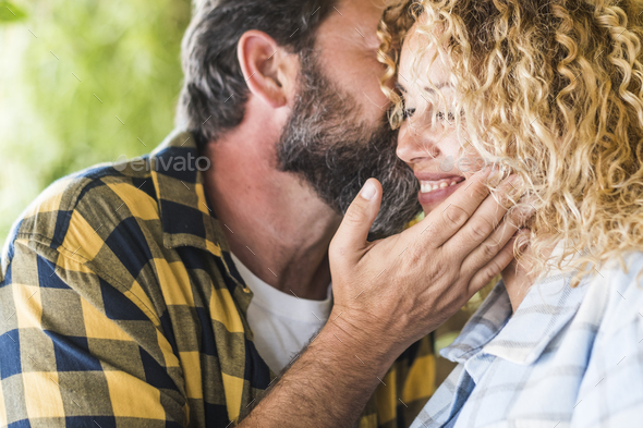 Portrait of happy cute couple in love hugs and smiling Stock Photo