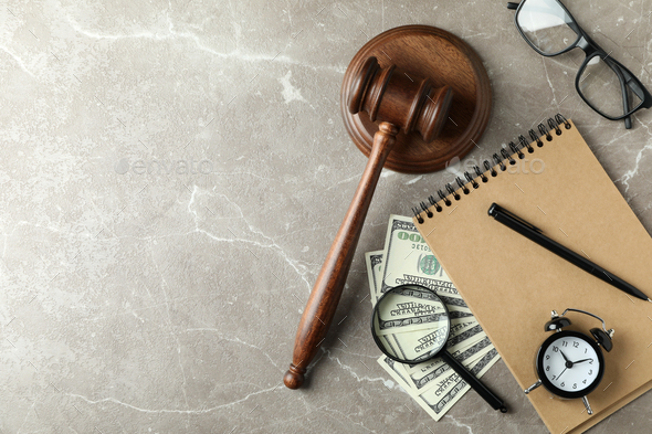 Law concept with judge gavel on gray textured table - Stock Photo - Images