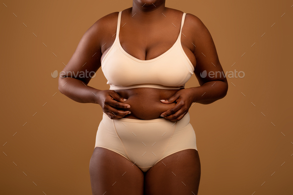 Couple, voluptuous woman wearing bra and underwear, Stock Photo