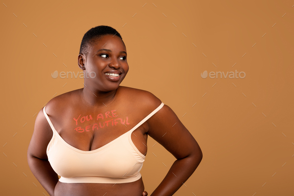 Young beautiful plus size model with big breast, black bra Stock