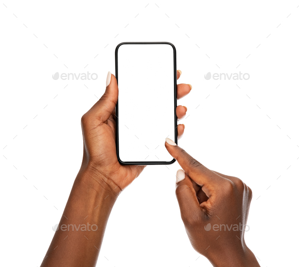 Black woman hands using smart phone on white background - Stock Photo - Images