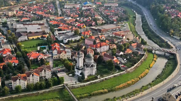 Aerial drone view of Sighisoara, Romania. Old buildings, Holy Trinity Church alt