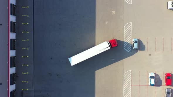 Aerial View of Cargo Containers and Distribution Warehouse alt