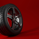 Car wheel isolated on a red background. Tyre. Poster design. 3d illustration - PhotoDune Item for Sale