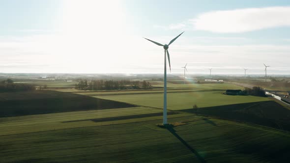 Aerial Windmills Wind Turbines Producing Clean Ecological Electricity in Green Agricultural Fields alt