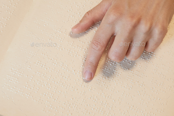 Hand Reading Braille Font - Stock Photo - Images