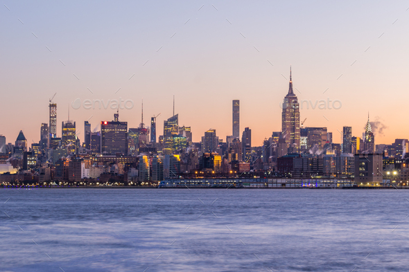 Illuminated Manhattan Cityscape in the Morning Twilight. New Yor
