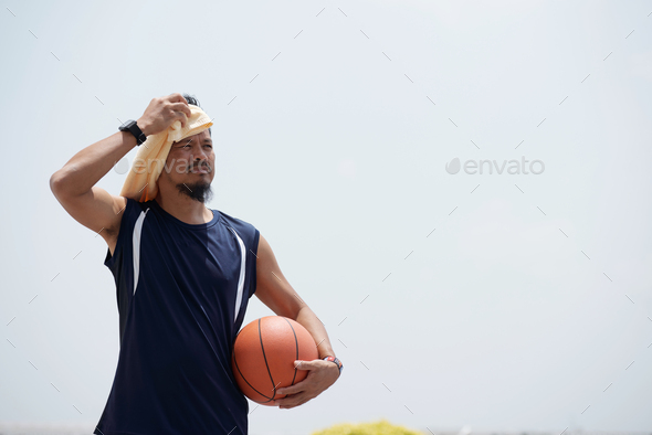 Basketball Player Wiping Off Sweat