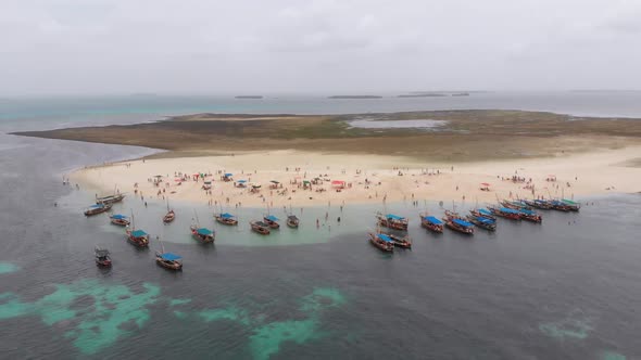 Aerial View Disappearing Island with Tourists and Boats in Menai Bay Zanzibar alt