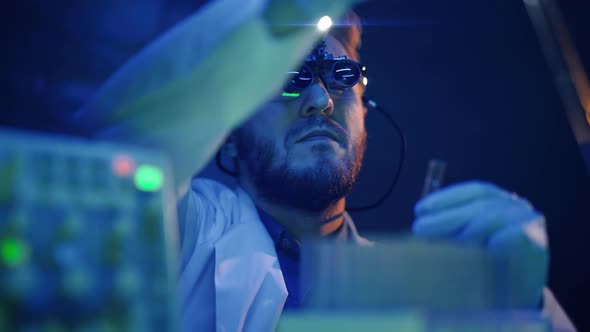 Scientist is Analyzing Samples in Medical Research Laboratory alt