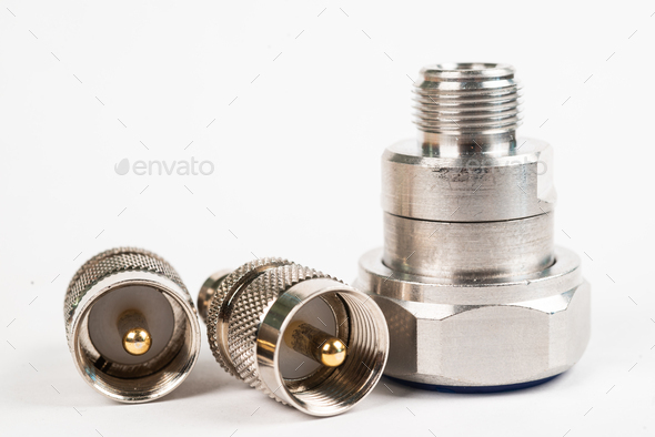 High frequency connectors component with a shiny copper nickel plating covering - Stock Photo - Images