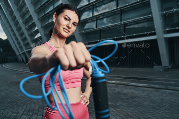 Female passing a skipping rope with right hand