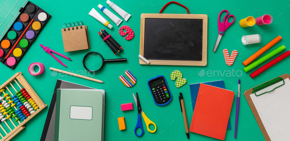 School supplies on red background. Education, Back to School, kids  creativity concept Stock Photo by rawf8
