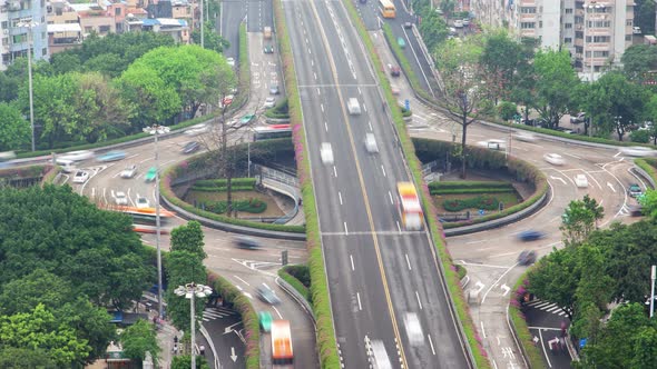 Guangzhou Roundabout Highway Traffic Aerial Cityscape Panorama China Timelapse Pan Up alt