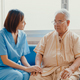 Young Asian woman nurse caregiver encourage take care her senior patient hold hand explain. - PhotoDune Item for Sale