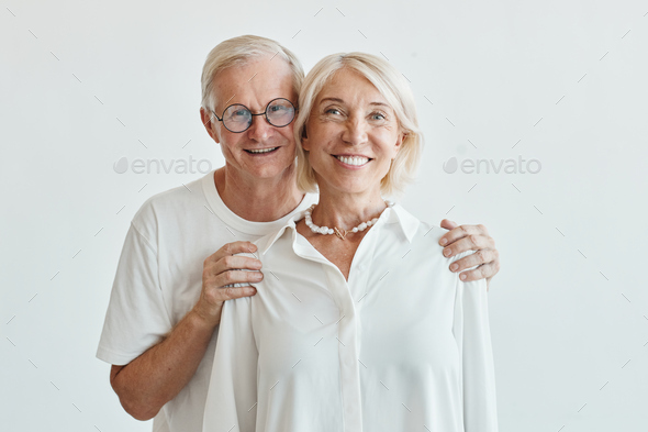 Portrait of Senior Couple on White